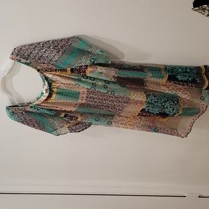 Elastic neckline, flutter sleeve, fully lined spring/summer dress.